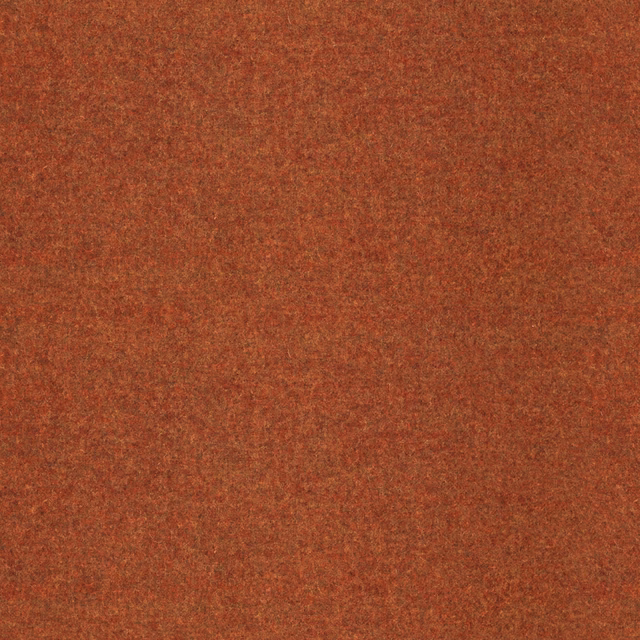 Mottled rust-bronze woven textile with a soft, granular surface