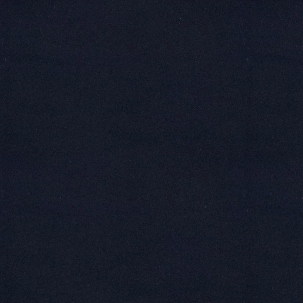 Deep navy textile with a subtly mottled, low-sheen surface in close-up