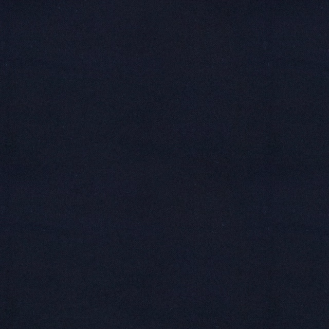 Deep navy textile with a subtly mottled, low-sheen surface in close-up