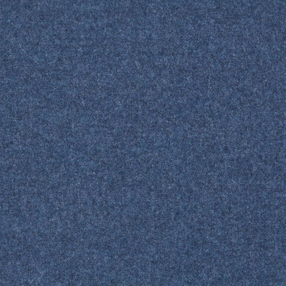 Close-up of dense mottled slate-blue fabric with a softly fuzzy textured surface