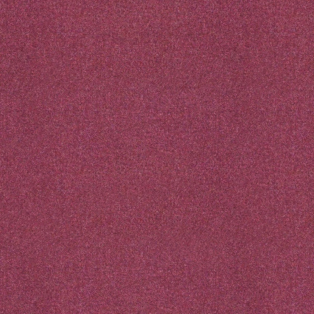 Close-up of muted plum fabric with a fine, softly mottled woven texture