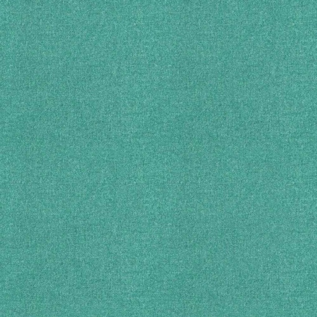 Close-up of plain turquoise teal fabric with a softly mottled woven texture