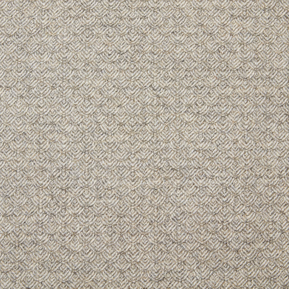 Warm natural greige fabric with a small repeating chevron weave and tactile surface