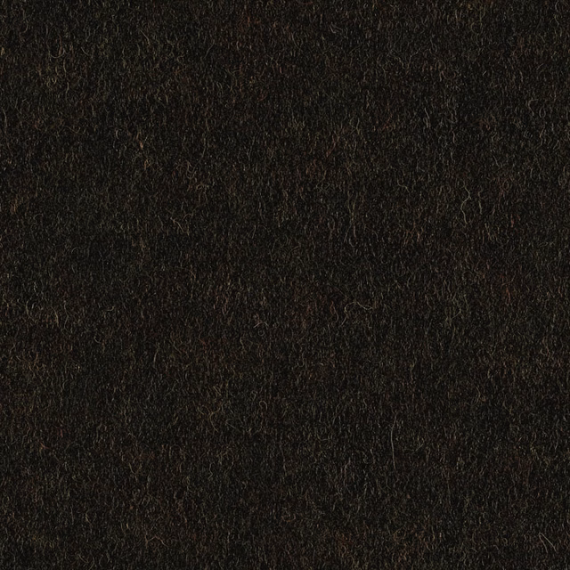 Deep forest-green fabric with a dark, softly mottled textured surface