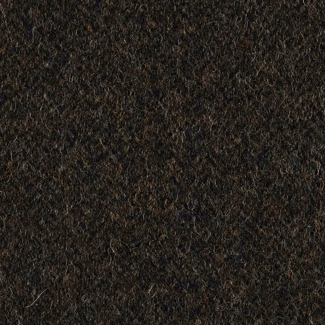 Near-black forest green fabric with brown flecks and dense nubby fibres