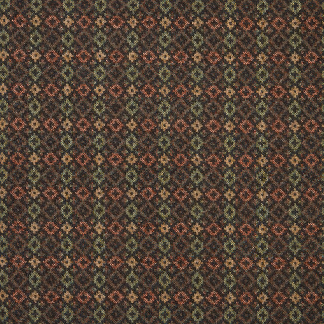 Dark evergreen woven textile with rust and tan diamond motifs