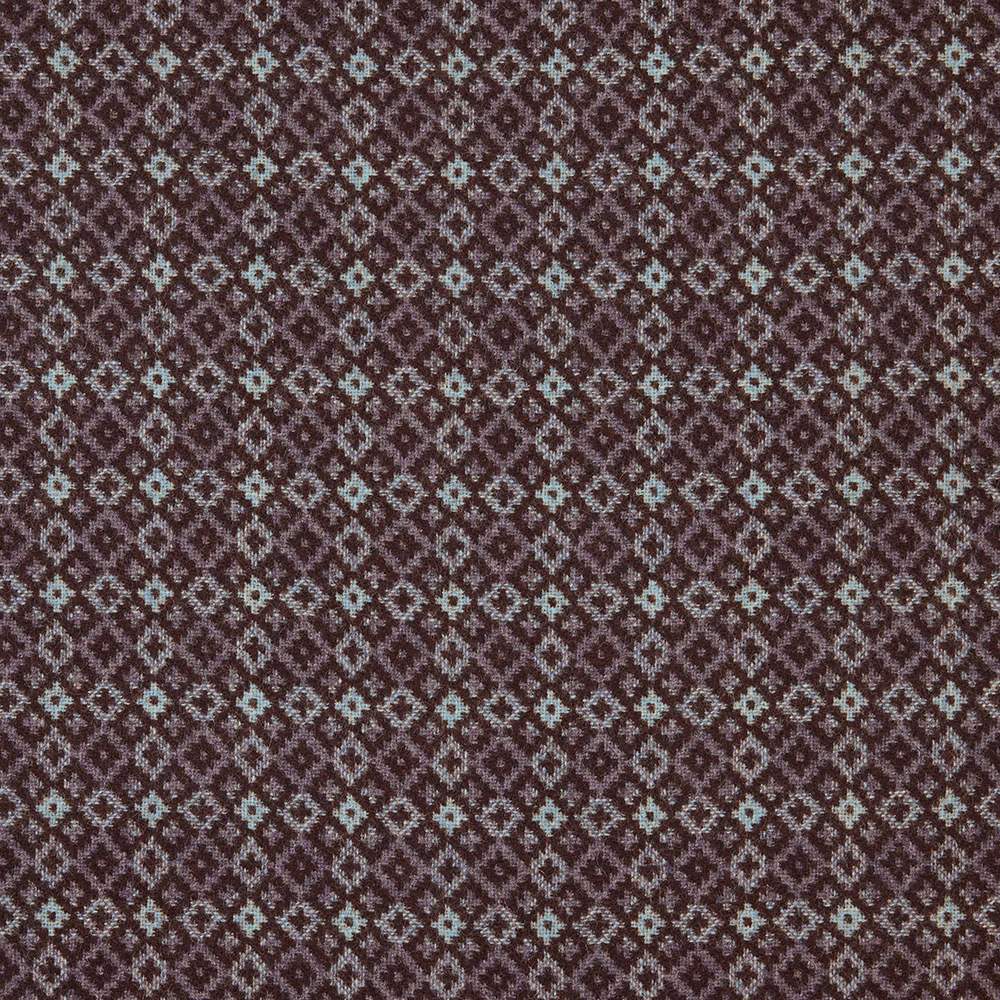 Deep indigo and plum-brown woven fabric with tiny pale diamond motifs