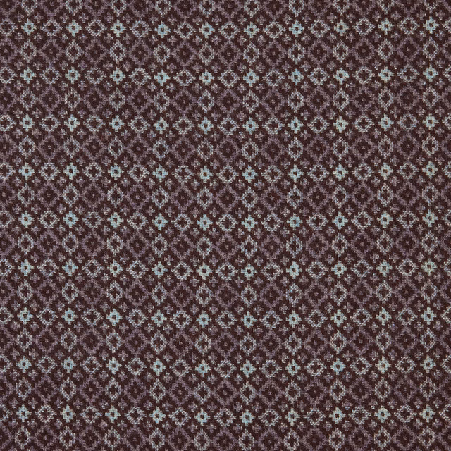 Deep indigo and plum-brown woven fabric with tiny pale diamond motifs