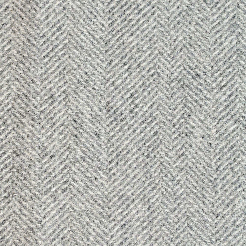 Cool pale-grey woven herringbone with a softly flecked chevron texture