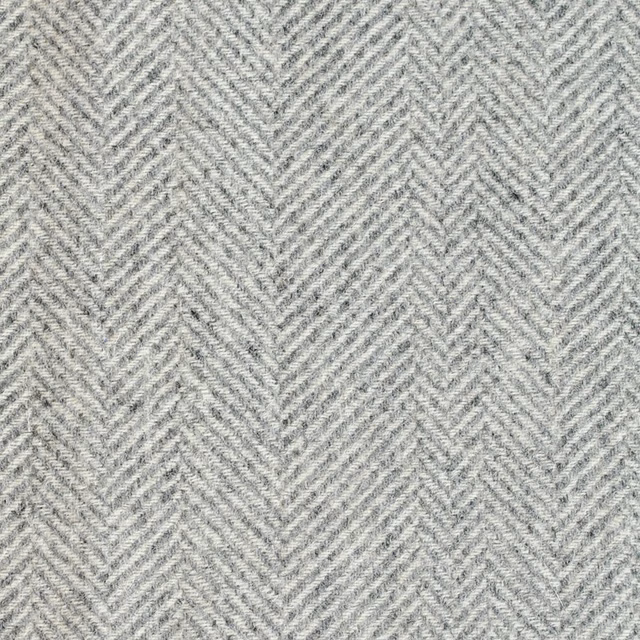 Cool pale-grey woven herringbone with a softly flecked chevron texture