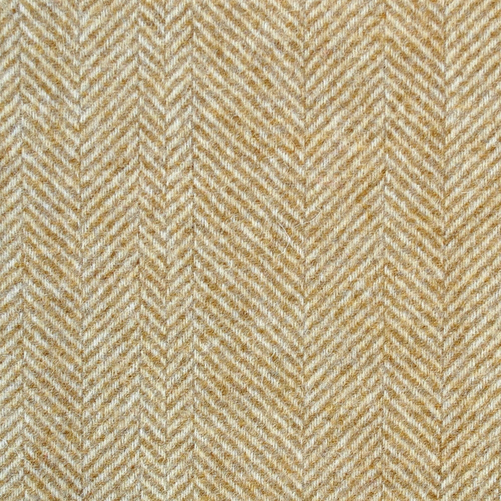 Warm yellow, cream and beige woven herringbone textile with fine textured chevrons