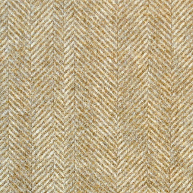 Warm yellow, cream and beige woven herringbone textile with fine textured chevrons