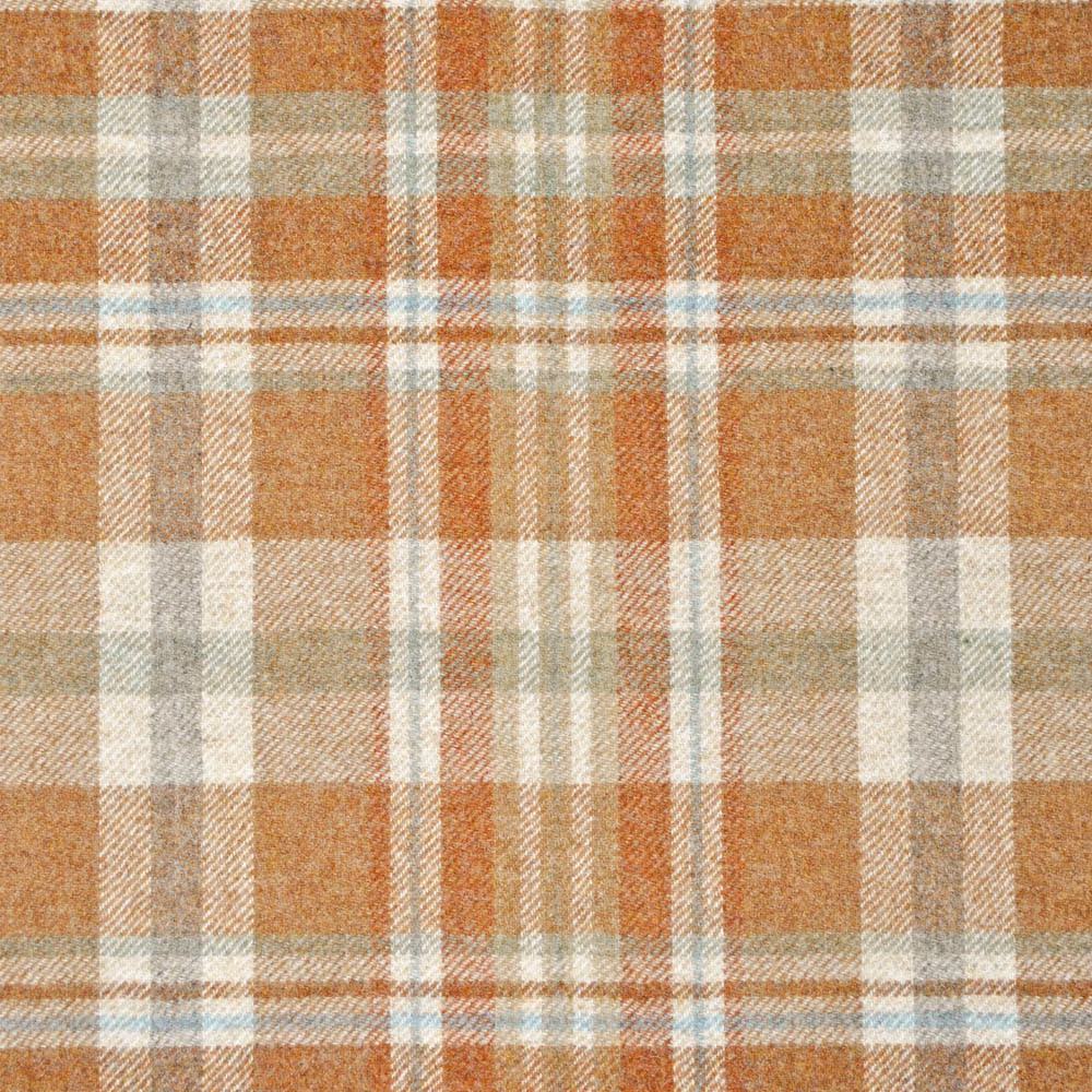 Rust and aqua plaid with cream checks and a softly textured woven surface