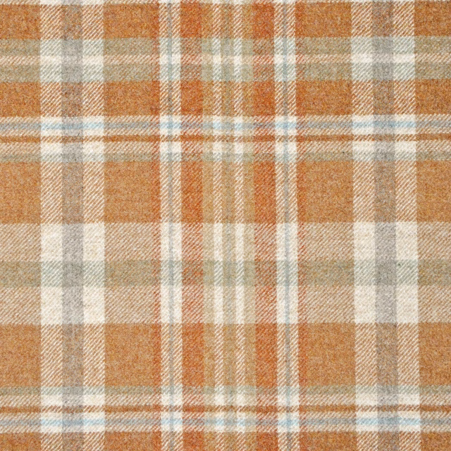 Rust and aqua plaid with cream checks and a softly textured woven surface