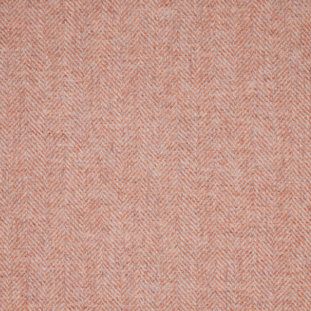 Dusty blush pink fabric with a finely textured small-scale herringbone weave