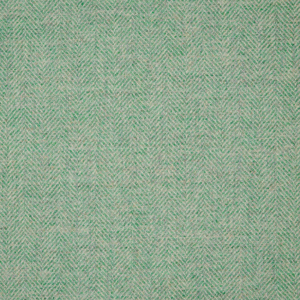 Soft mint-green herringbone weave with warm beige flecks and fine texture