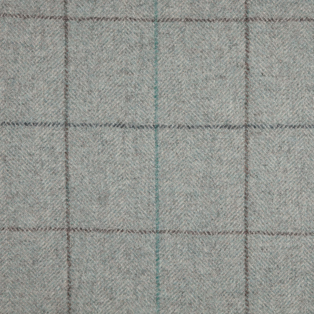 Cool slate blue-grey herringbone with charcoal pane lines and a muted teal accent