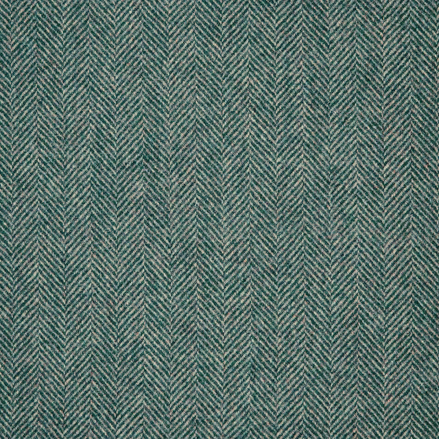 Close-up of muted teal and grey fabric with a fine directional herringbone weave