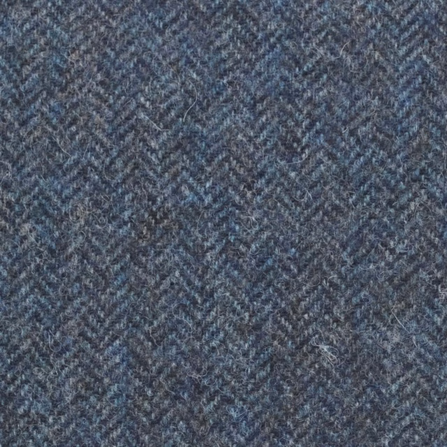 Close-up of blue-grey Insignia fabric with fine herringbone weave and soft flecking
