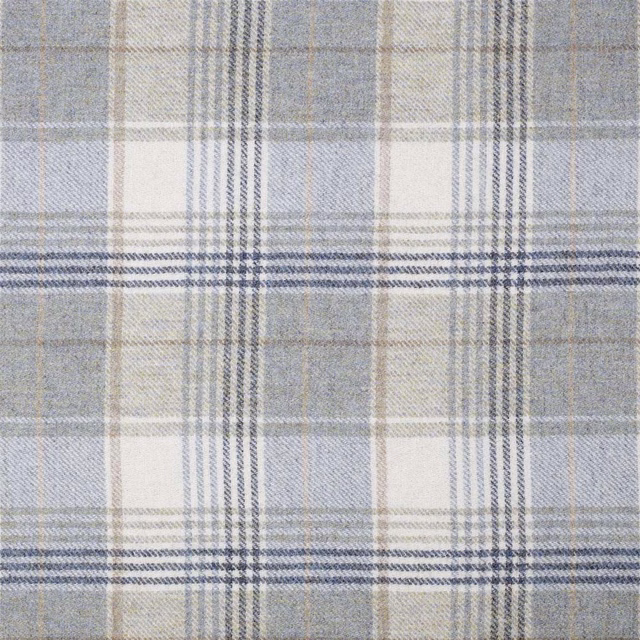 Pale glacier blue plaid fabric with cream, grey and charcoal woven checks