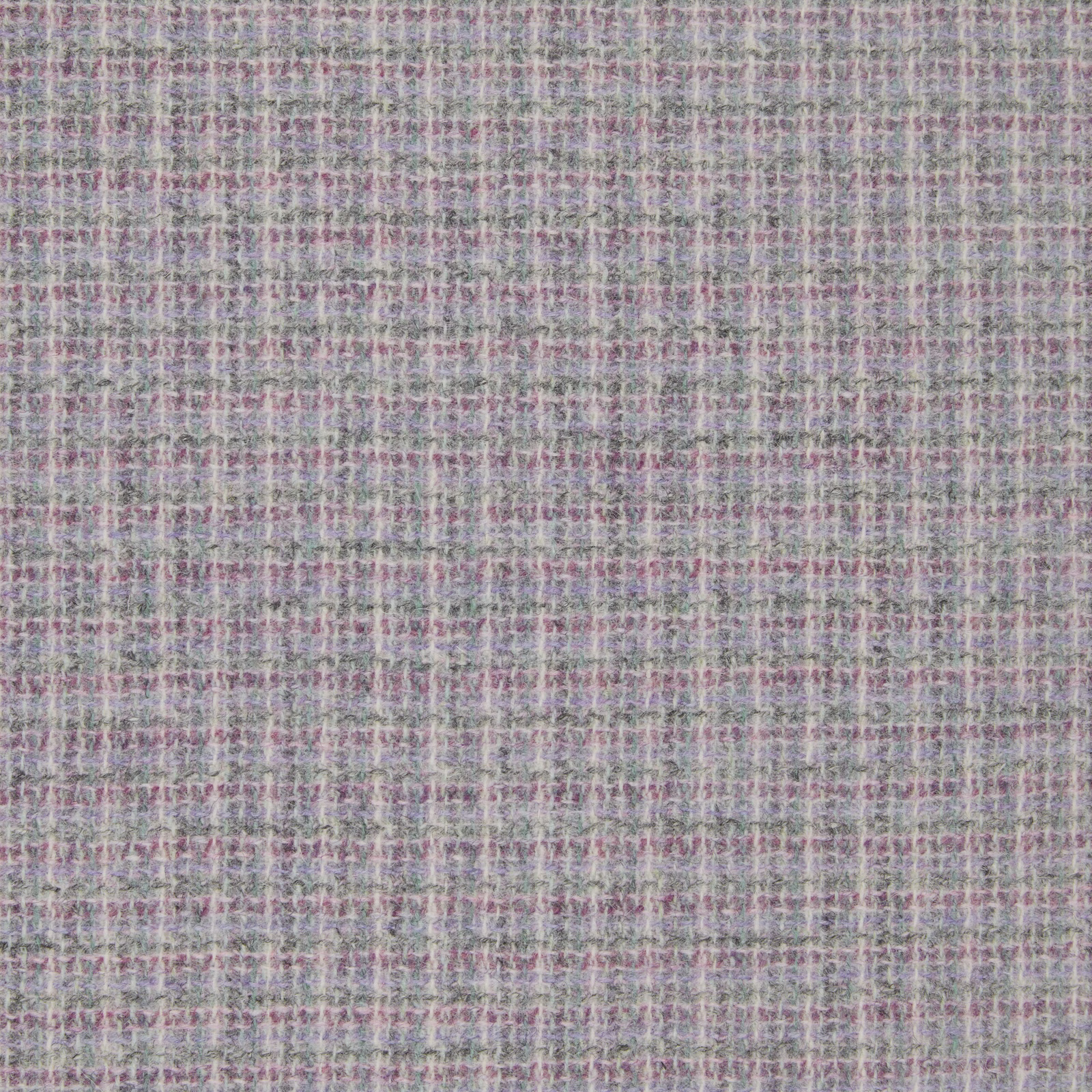 Close-up of cool lilac-grey weave with blush, sage and cream threads