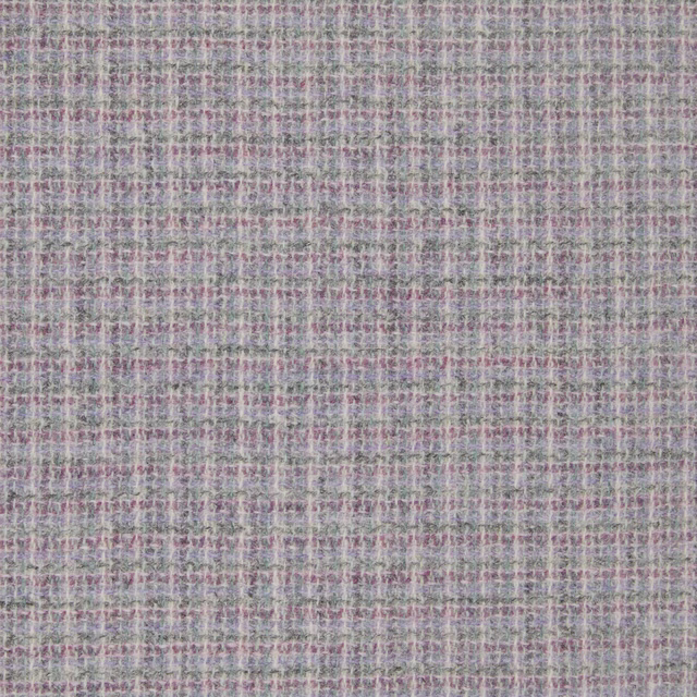 Close-up of cool lilac-grey weave with blush, sage and cream threads