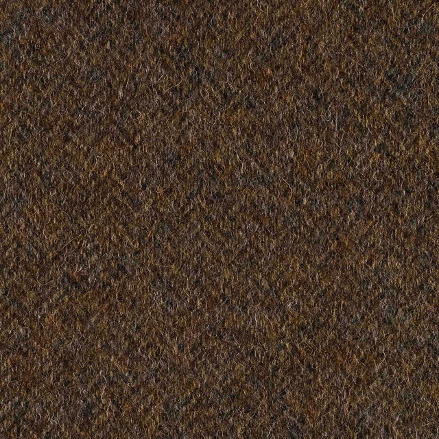 Dark loden green shaggy weave with brown and charcoal flecks in close view