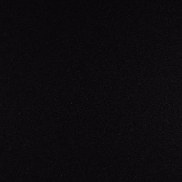 Near-black fabric swatch with a faintly mottled, low-contrast surface