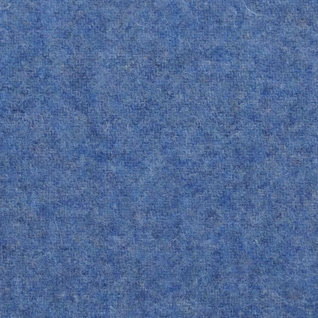 Mottled marine-blue textile with a soft, flecked surface and cool tonal depth