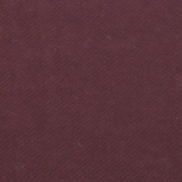 Deep maroon woven textile with subtle diagonal grain and soft tonal variation