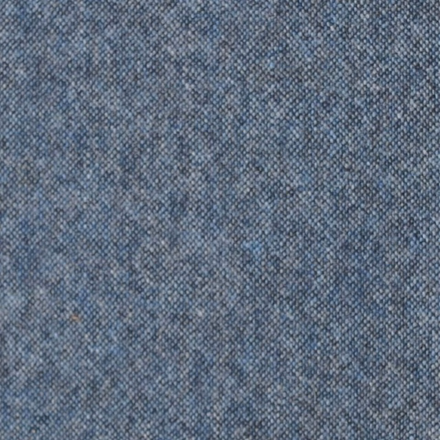 Close-up of muted mid-blue and grey threads in a fine woven texture
