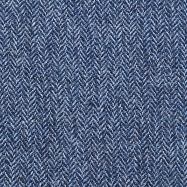 Close-up of cool mid-blue woven herringbone with fine charcoal-grey contrast