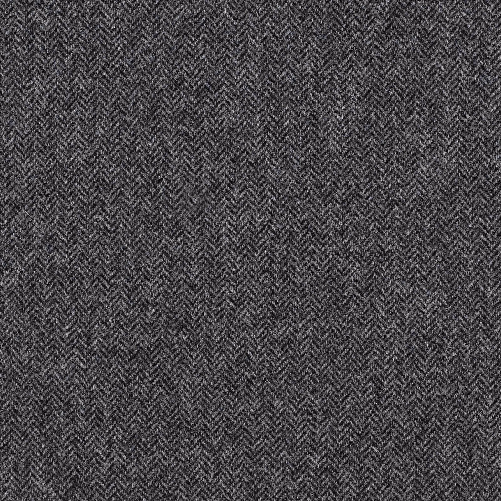 Dense mid-grey herringbone weave with charcoal-and-silver flecks