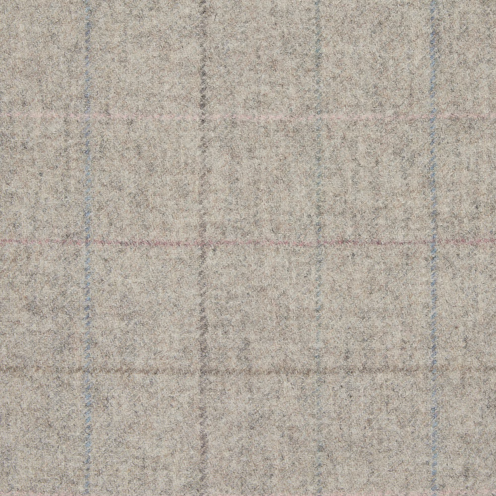 Close-up of softly textured sandstone beige plaid with faded blue-grey and blush lines