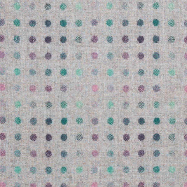Heather woven fabric with small rows of teal, mint, plum and pink spots