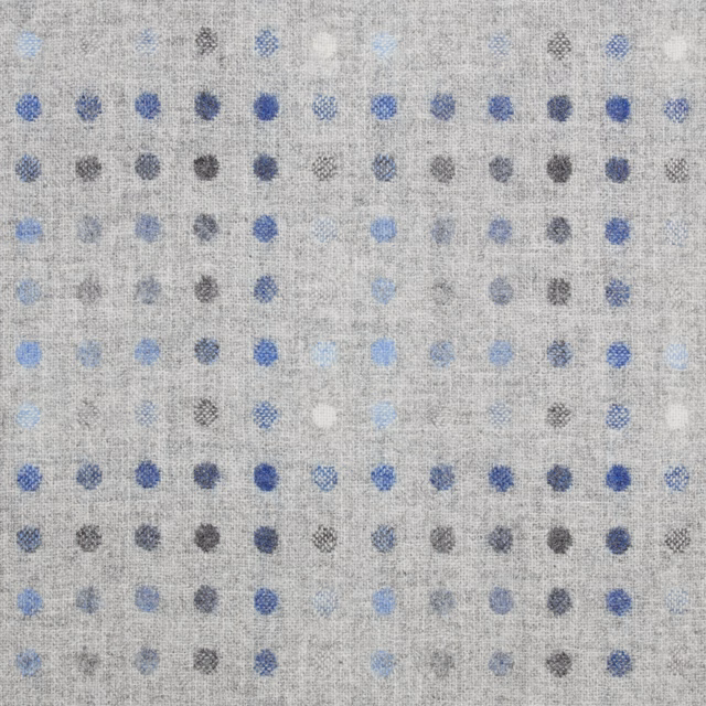 Silver-grey woven textile with denim-blue, charcoal and pale blue spots in rows