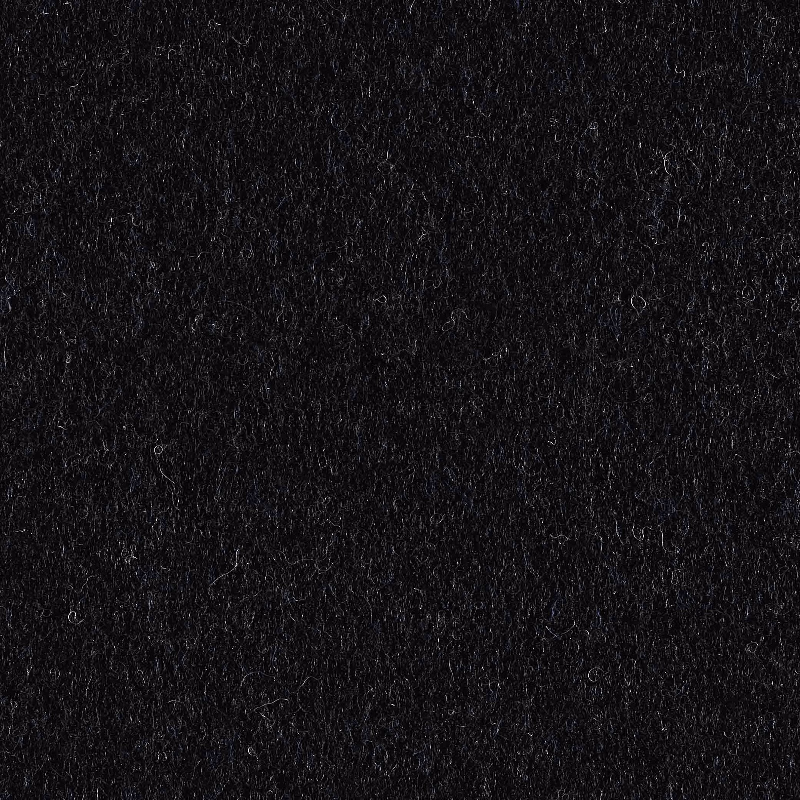 Deep navy-black fabric swatch with dense fuzzy fibres and subtle tonal variation