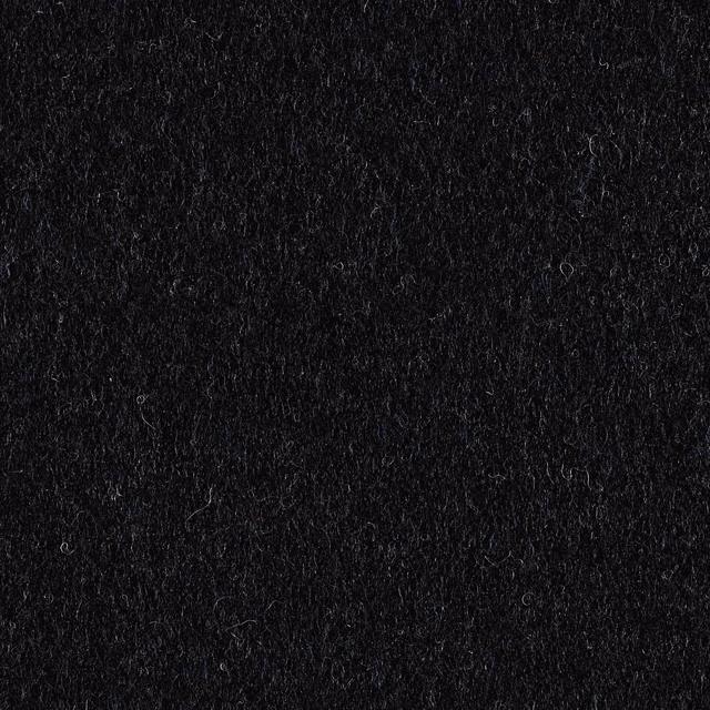Deep navy-black fabric swatch with dense fuzzy fibres and subtle tonal variation