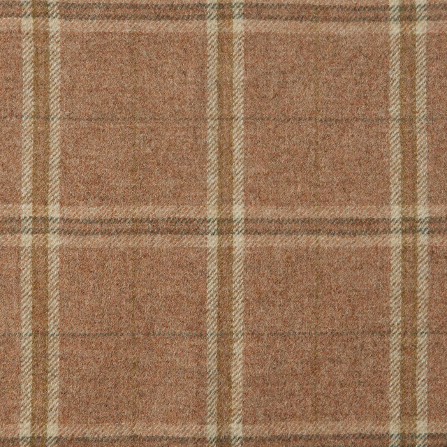 Warm terracotta plaid fabric with cream and muted olive lines, close-up
