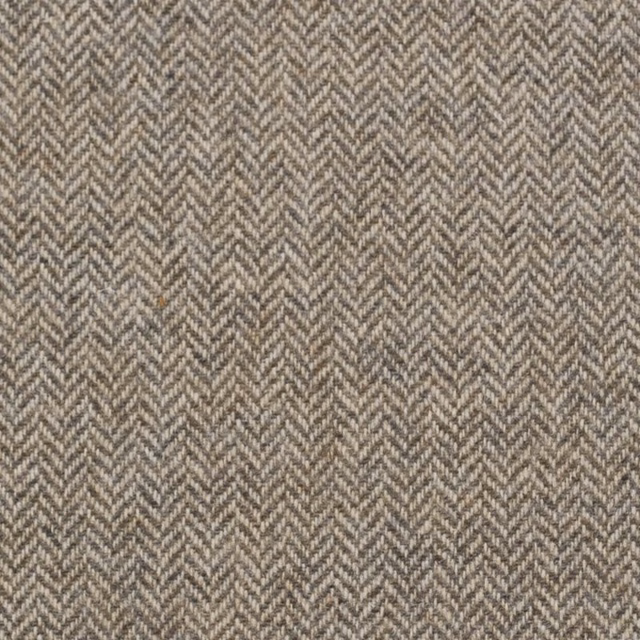 Close-up of warm oatmeal and taupe textile with a fine herringbone weave