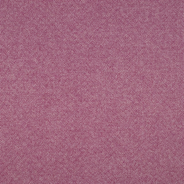 Dusty mauve-pink fabric with a fine, repeating parquet weave in close-up