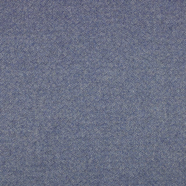 Muted denim-blue textile showing a fine grey parquet geometric weave