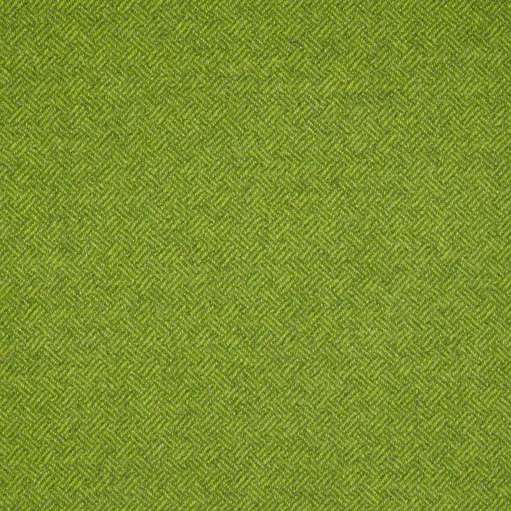 Close view of lime-green fabric with a tiny, textured parquet herringbone weave