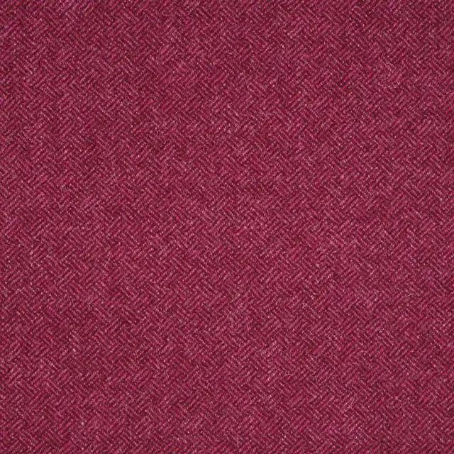 Deep raspberry red fabric with a small parquet-style diagonal woven texture