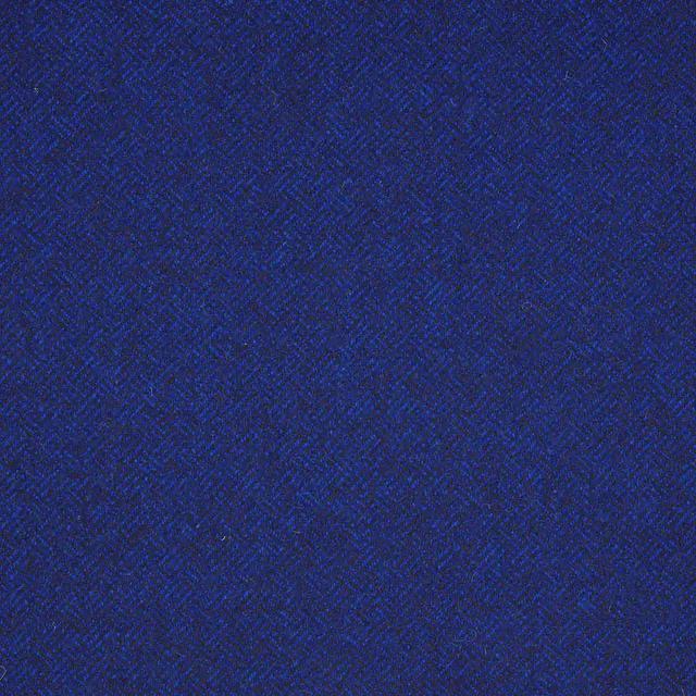 Deep royal-blue textile showing subtle, tightly woven parquet texture
