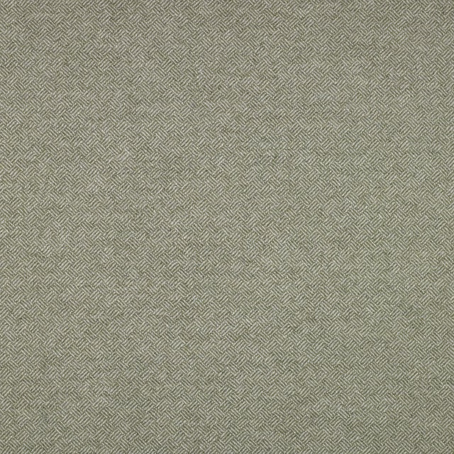 Close-up of muted sage-green fabric with a fine repeating parquet weave