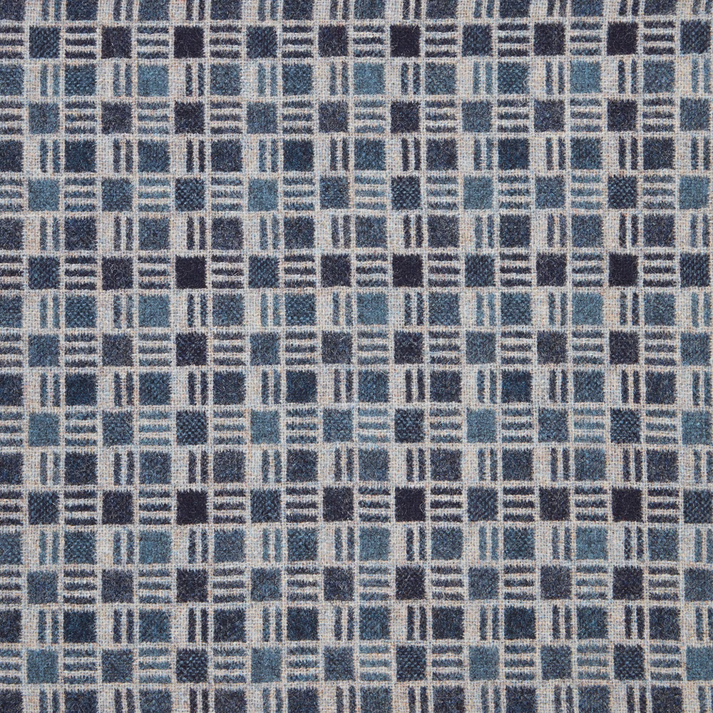 Denim-blue woven grid of dark squares, pale lines and textured blue bands
