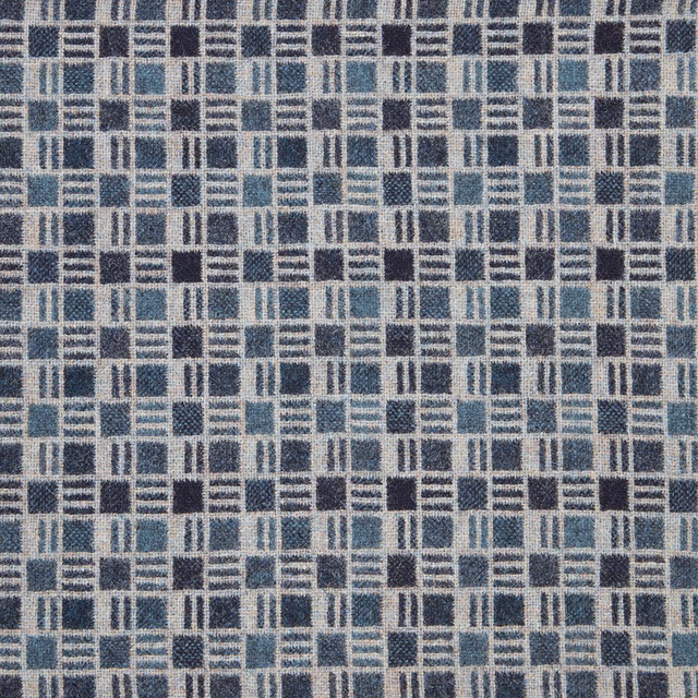 Denim-blue woven grid of dark squares, pale lines and textured blue bands
