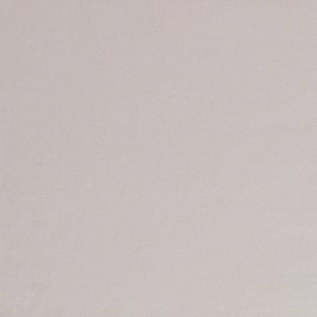 Close-up of pale dove-grey satin with a subtle warm sheen and fine even surface