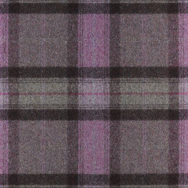 Close-up of a muted amethyst, charcoal and grey broad plaid with a softly grainy surface